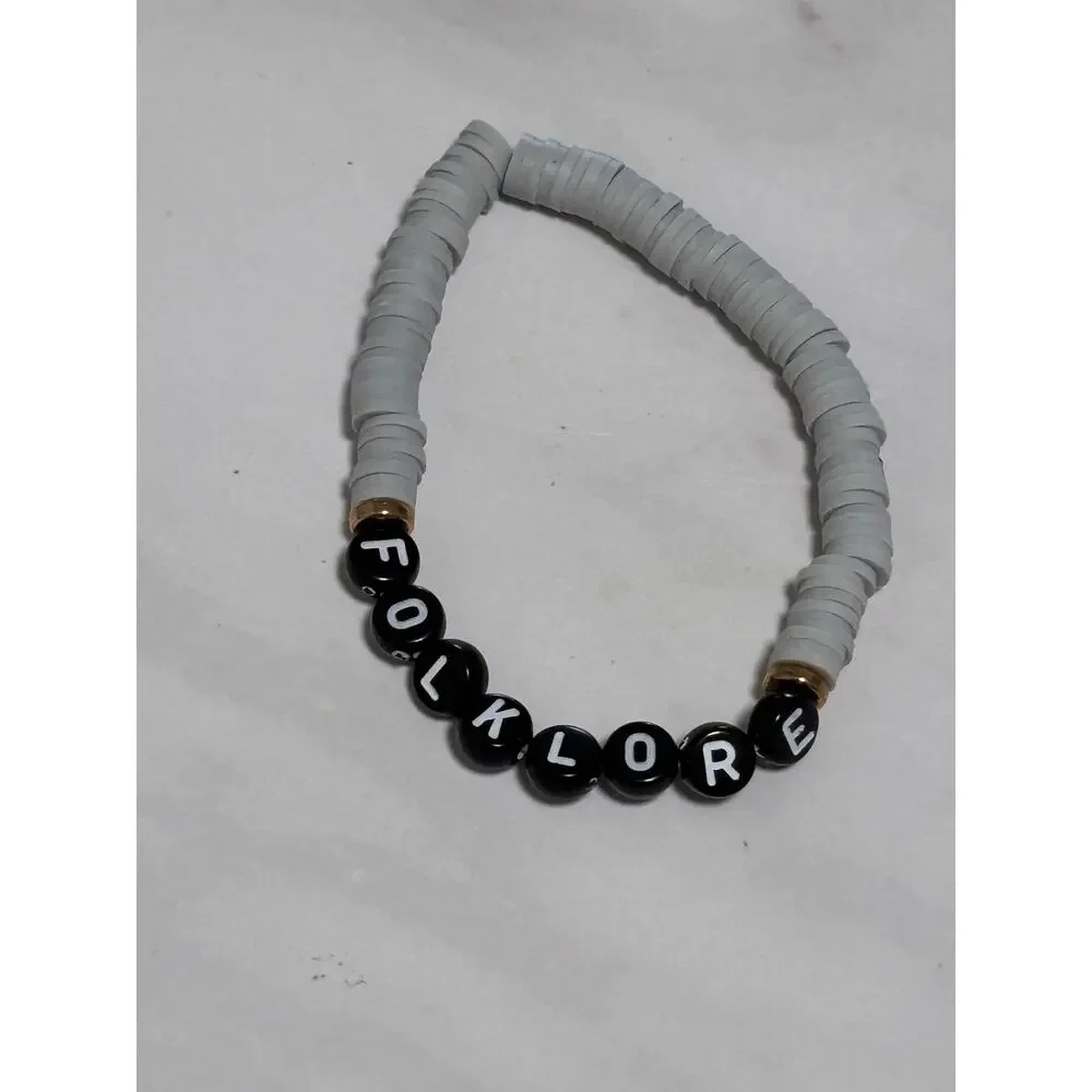 Folklore Grey Heishi Word Bracelet 7 Inch Polymer Clay Black White Letter Beads
